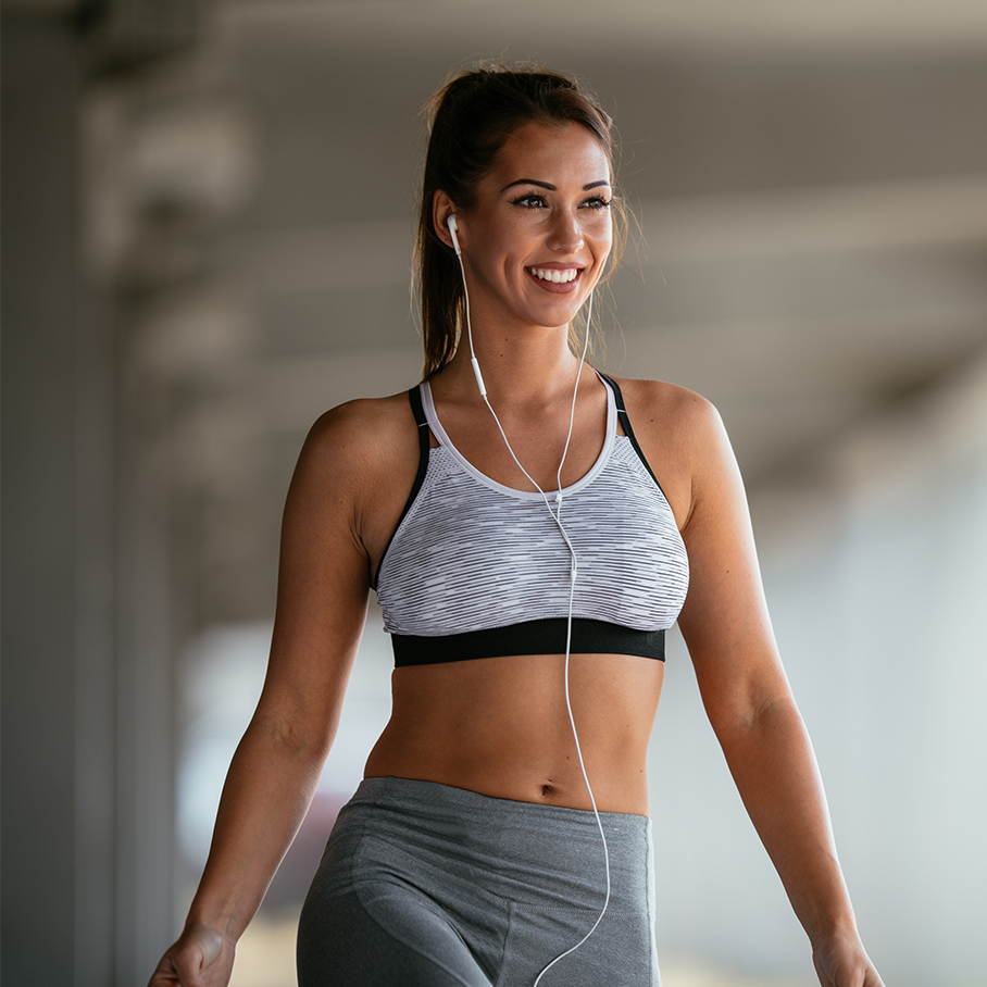 woman with abs after CoolSculpting in Stamford, CT