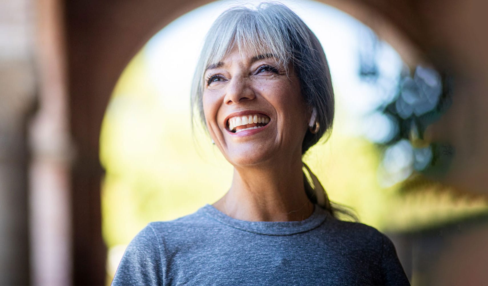Woman smiling after hormone replacement therapy in Colts Neck, NJ