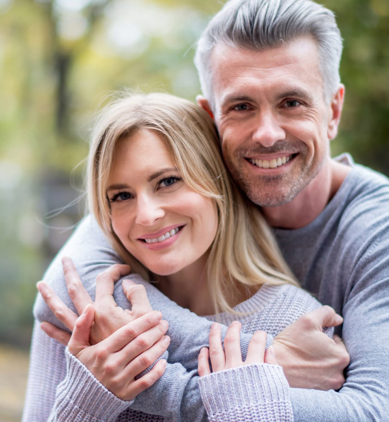 Man and woman holding each other