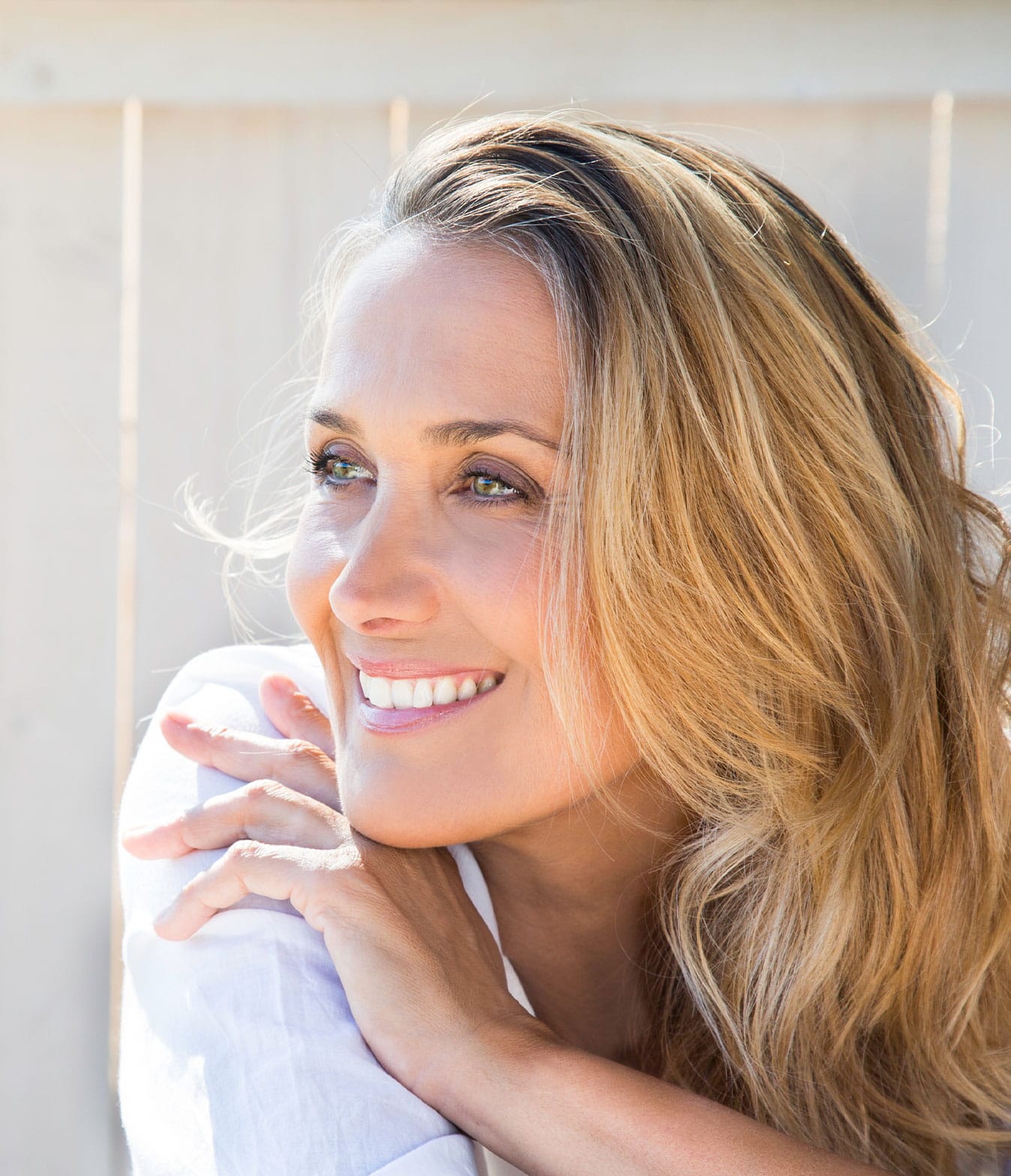 smiling woman after visiting the med spa in Orlando, FL