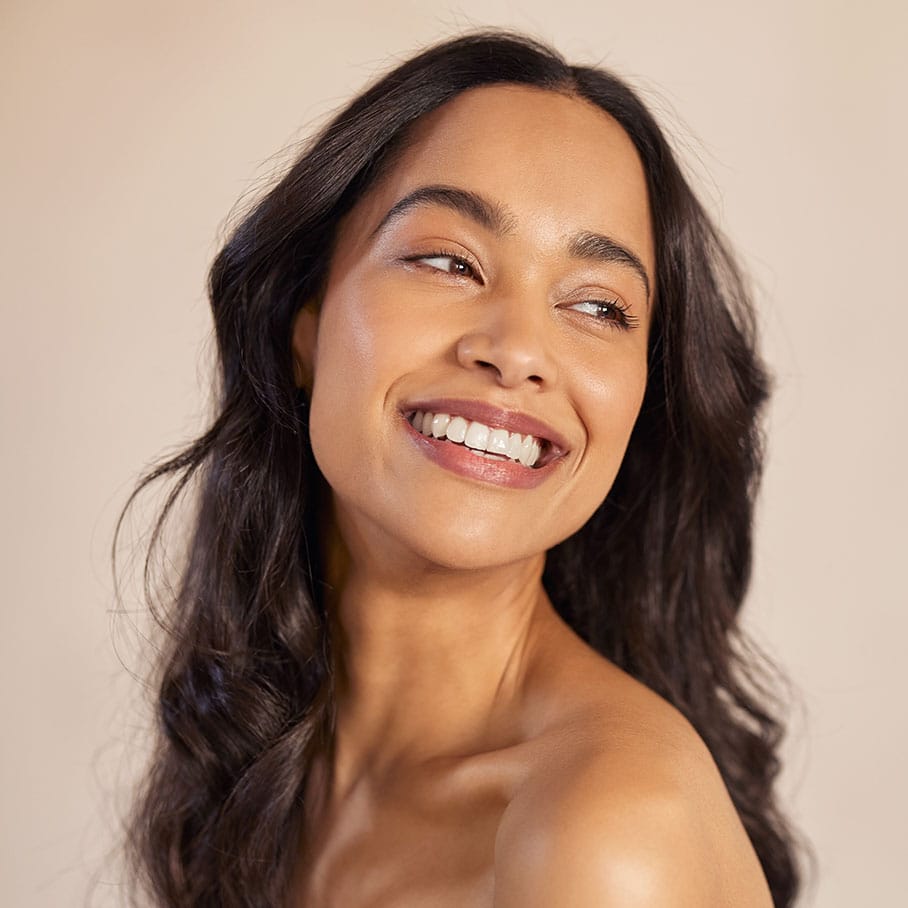 woman with beautiful skin after microneedling treatment in Naperville, IL