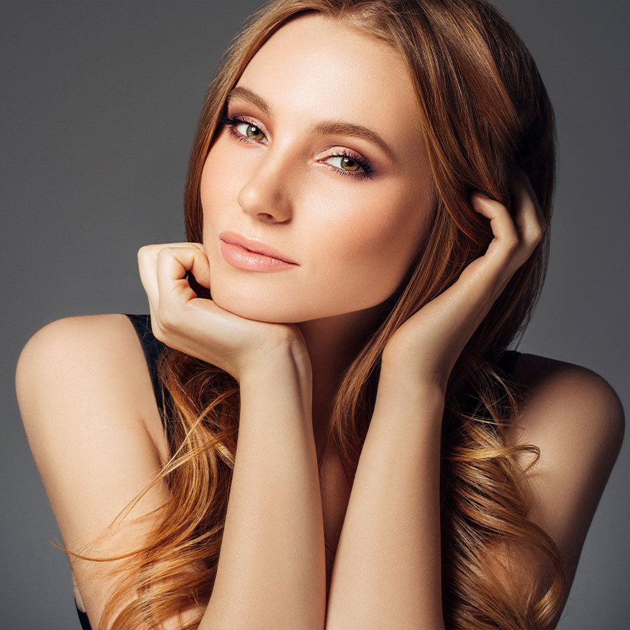 Woman with clear skin after CoolSculpting from Serotonin Centers.