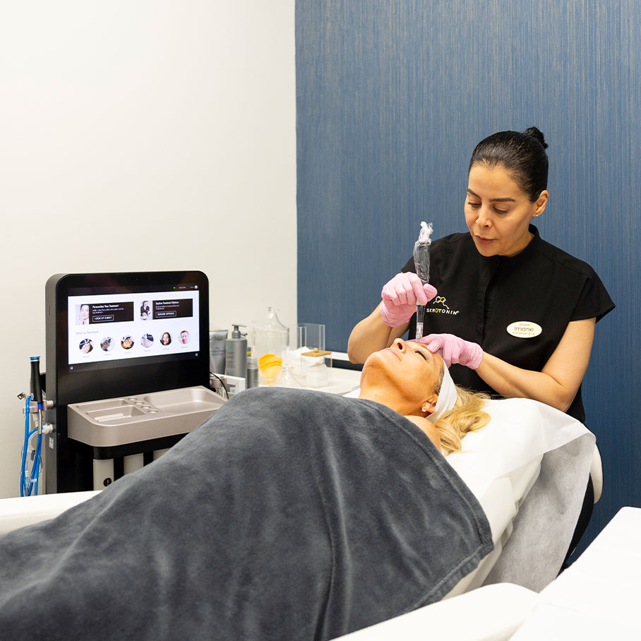 woman receiving microneedling treatment in Fort Worth, TX