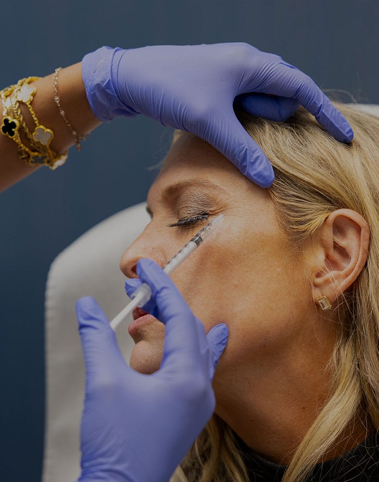 woman receiving med spa injection in Del Mar, CA