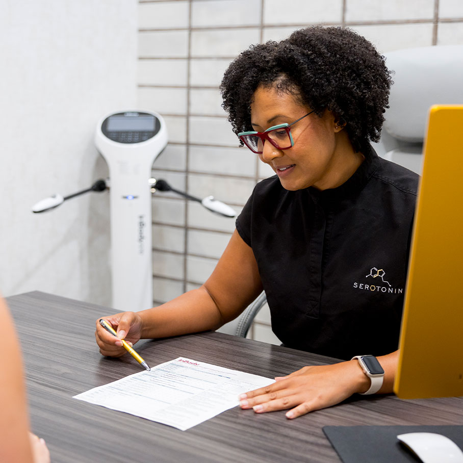 Serotonin Centers team member during consultation for weight loss program in Lake Nona, FL