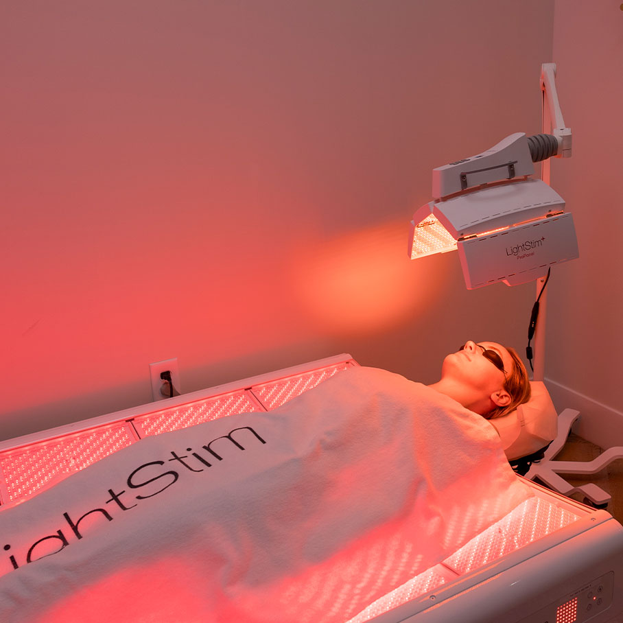 woman receiving red light therapy in Fort Worth, TX