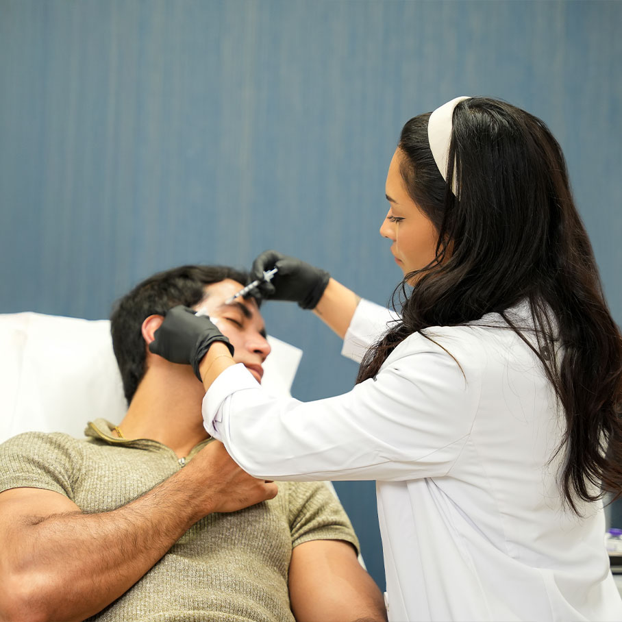Serotonin team member administering BOTOX to Fort Worth patient
