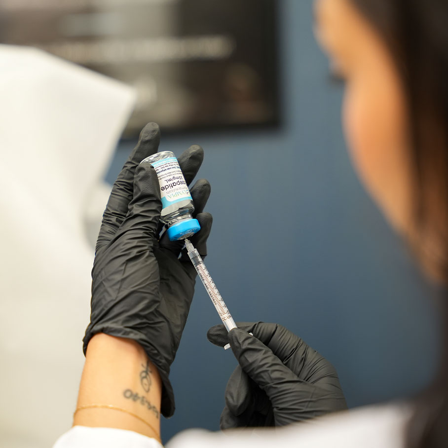 woman preparing weight loss injection in Fort Worth, TX