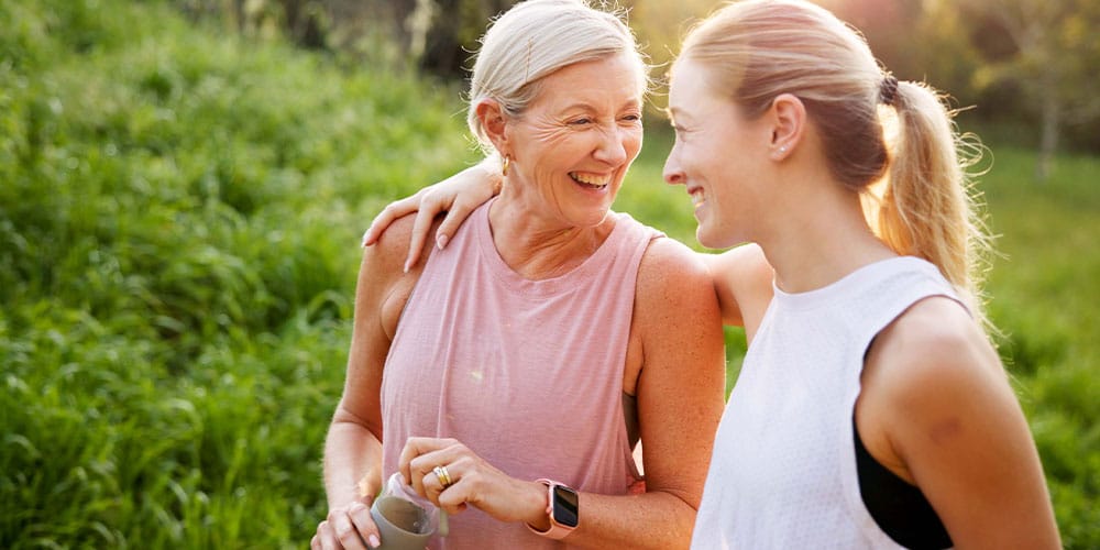mother and daughter on a walk after starting bioidentical hormone replacement therapy