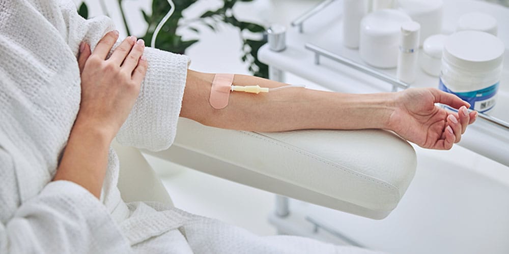 woman getting IV therapy treatment
